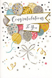 The image presents a beautifully detailed congratulations card, styled like a little celebration in print, perfect for slipping alongside a fresh bouquet delivered anywhere in Greenford. Dominating the design is a playful yet elegant arrangement of balloons rising from the lower part of the card, gathered tightly at their strings yet drifting upward with a sense of lightness. The balloons come in soft metallic shades-gold, silver, champagne-and gentle pastels of sky blue, blush pink, and smoky grey. Some are sprinkled with fine stars, others brushed with glittery textures or wrapped in slim, curved stripes, creating a layered, almost tactile effect as if each shape has been carefully embossed. From their base, descending ribbons in gold and silver curl and twist, forming a graceful cascade that leads the eye downward, like decorative streamers at a party just off Greenford Road. Across the centre floats a smooth, pale banner with the words Congratulations To You written in refined, flowing calligraphy, giving the card a personal, heartfelt tone. The background is a soft, creamy white dotted with tiny stars, confetti-like specks, and whimsical swirls that suggest joyful movement without crowding the composition. Subtle lighting emphasises the metallic highlights, making the artwork appear softly luminous, as if catching daylight in a local Greenford florist's window. The overall feeling is one of warm, polished celebration-ideal for marking life's big achievements, from exam results to promotions or special milestones, with a touch of gentle glamour.